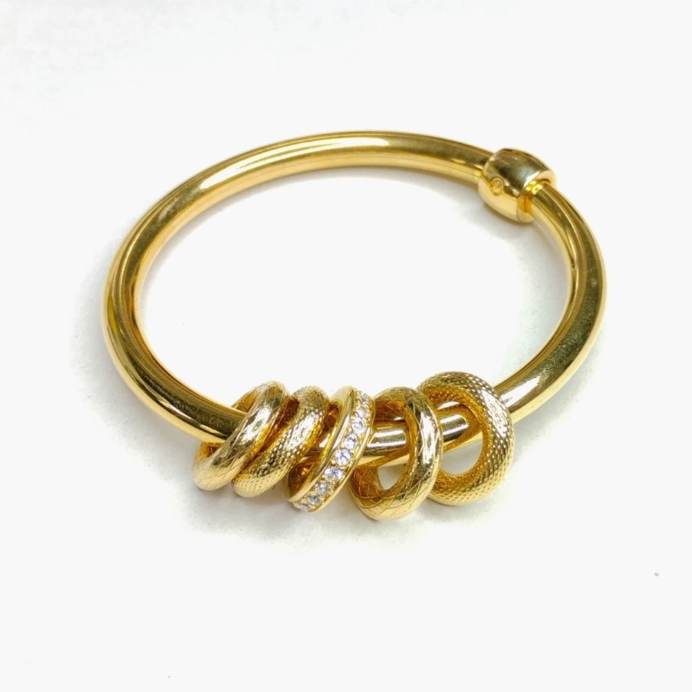 Swarovski Gold Bracelet with Textured and Crystal Rings